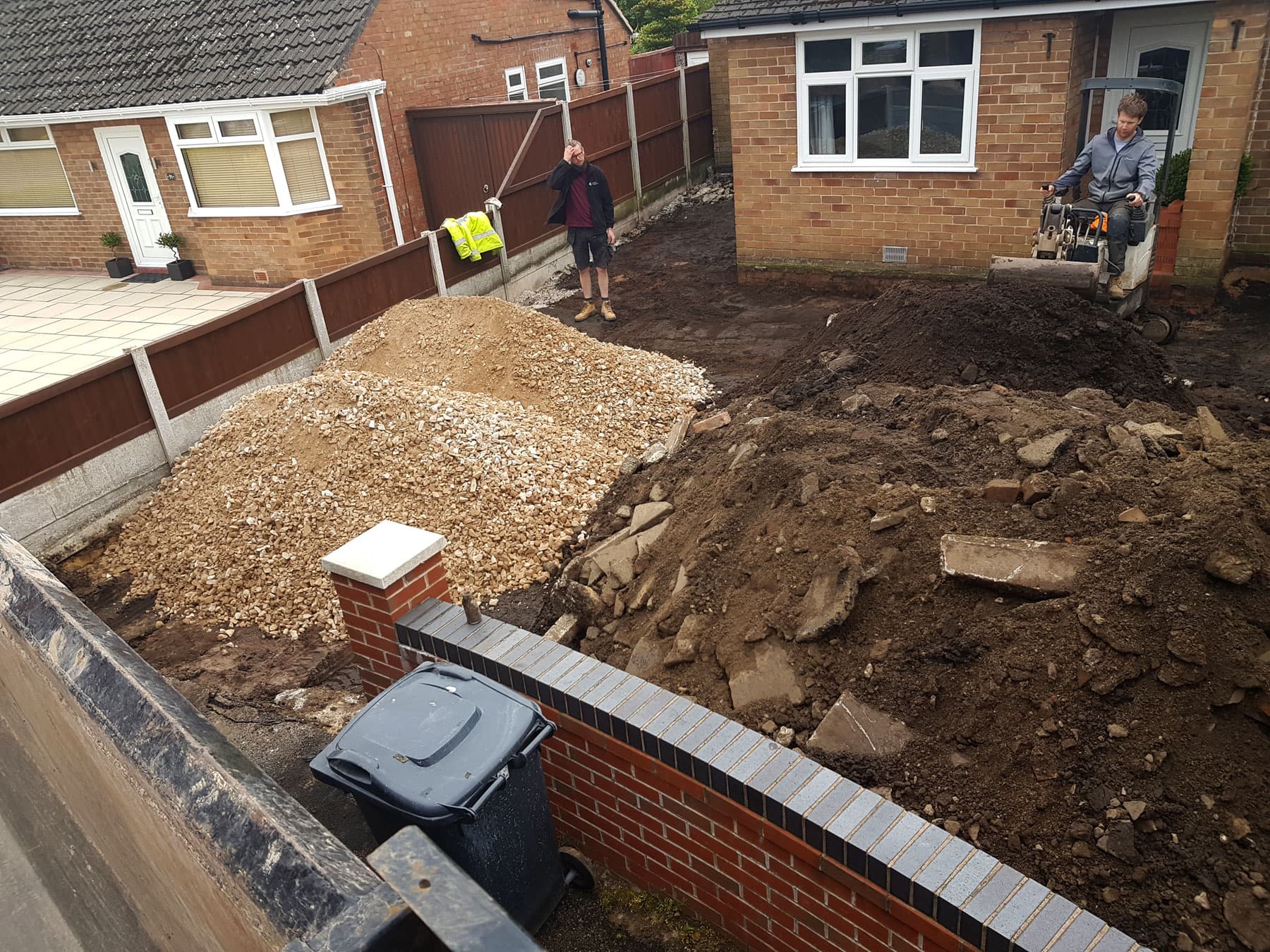 Grab hire truck delivering limestone.