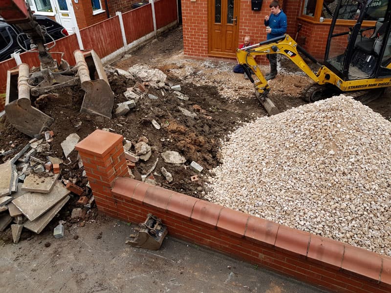 Unloading stone in Chorley and collecting muck.